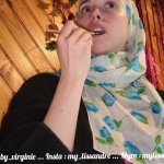 a beautiful veiled muslim student touches her hairy never-shaved pussy
