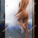 Brunette Nude Sauna Rearview Stockfoto 1367434868
