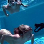 Jessica and Lindsay swim naked in the pool
