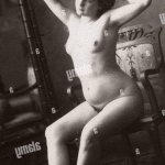 Early 20th century studio portrait of a nude naked young woman