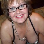 Older amateur Busty Bliss holds her natural tits for a cumshot in POV mode
