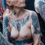 Inked and Wild: XXX Gallery of Tattooed Women at a Rock Festival Partying Naked in Public