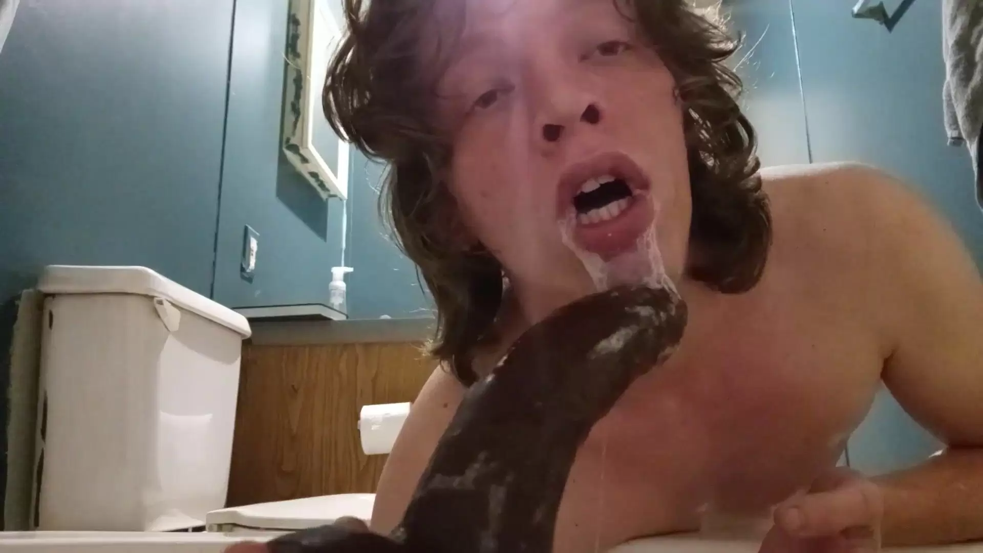 Male sucks dildo (photos)