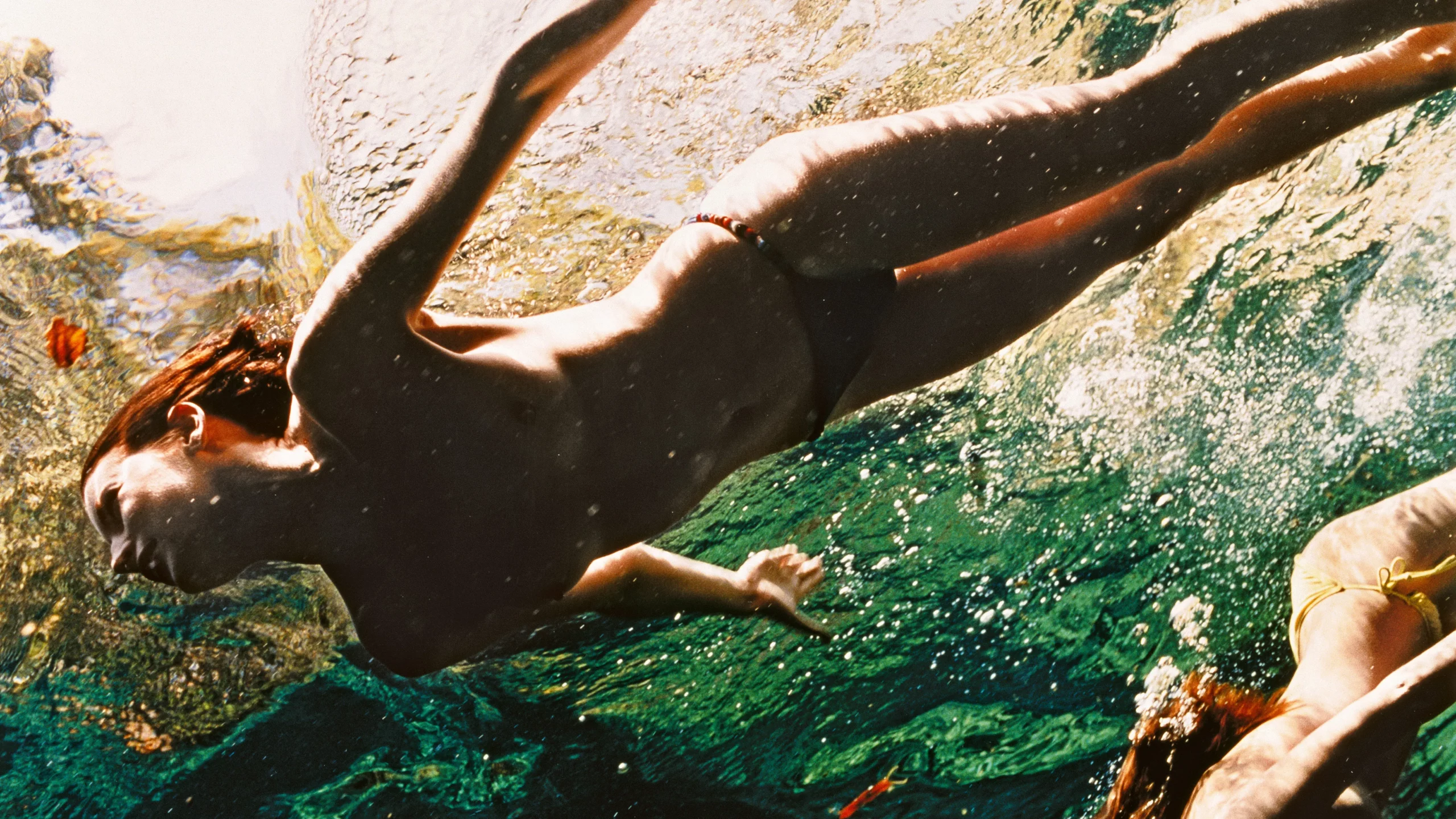 Naked swimming underwater (photos)